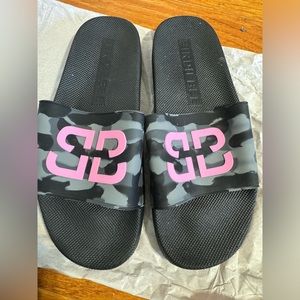 Woman slides from WWE Bella twins